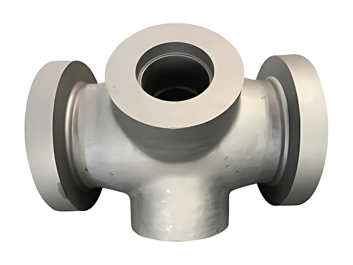 Cross valve bodies: Four-way valve body with machined flanges