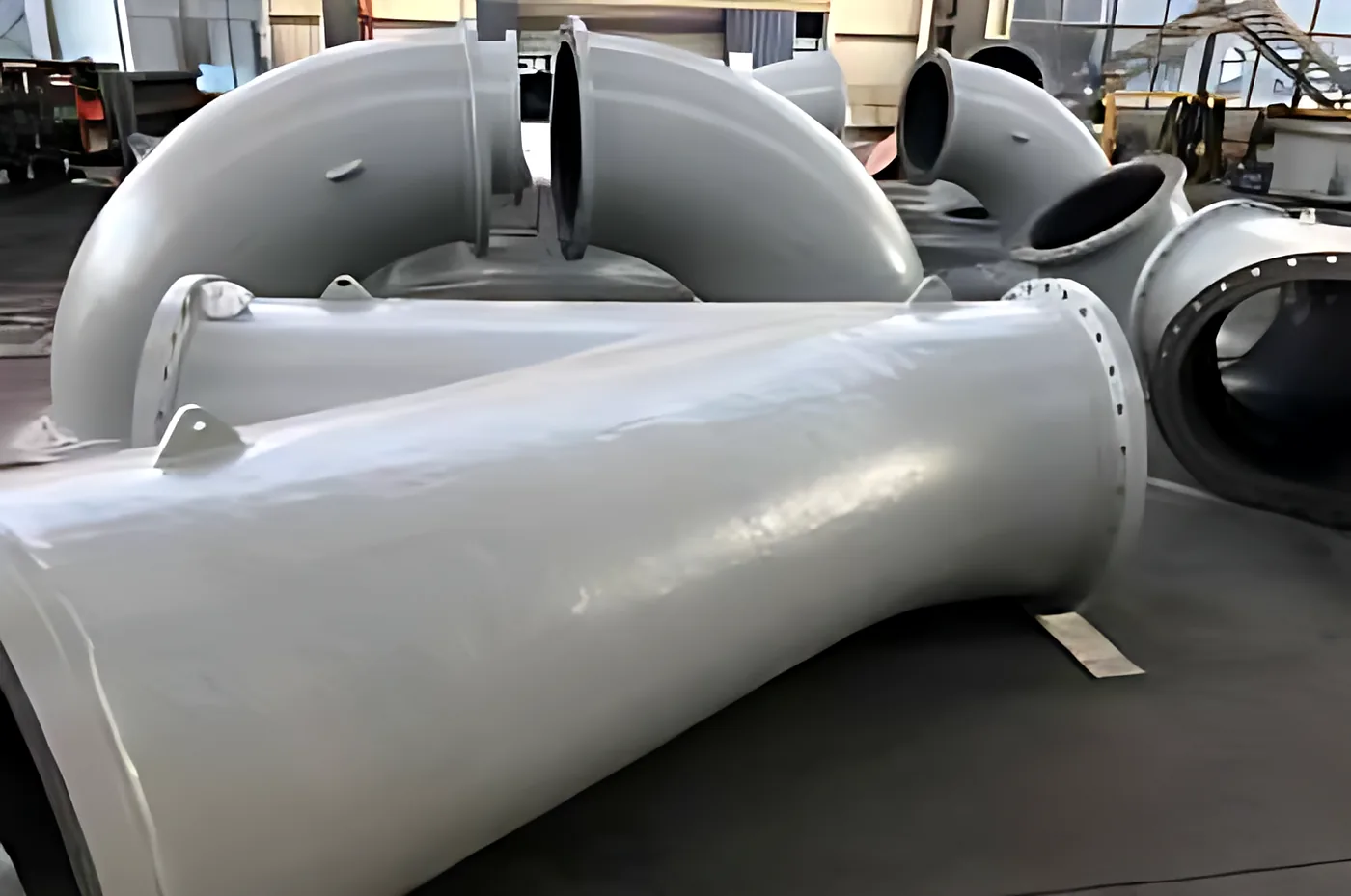 Dredge pipe bends: Cast pipe bends with machined flanges